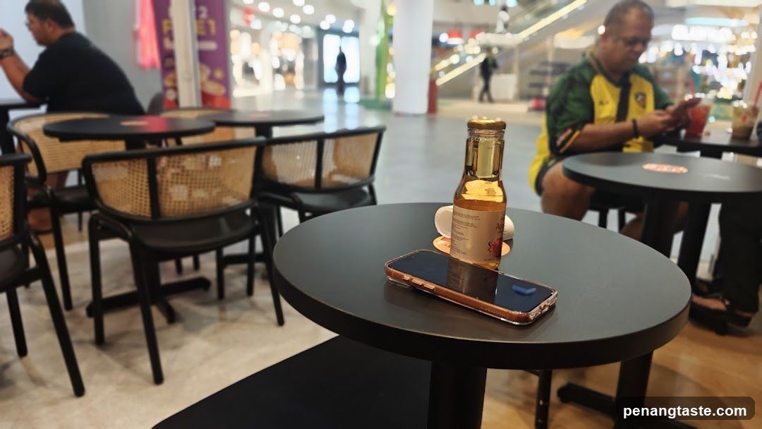 Cafe Interior with Drinks and Phone