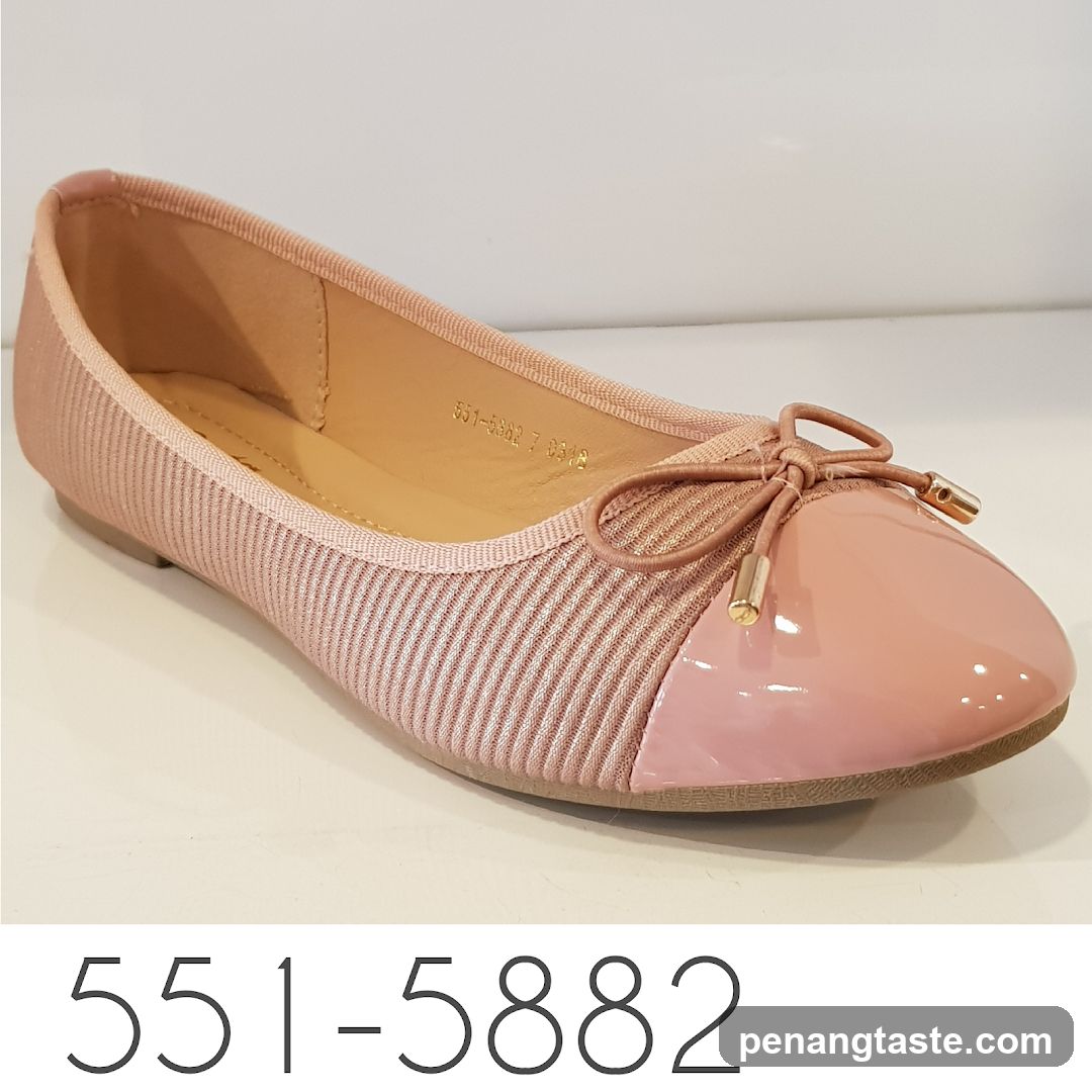 Pink ballet flats with bow detail