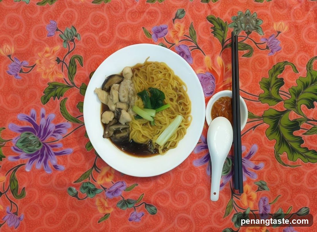 Noodle Bowl with Chopsticks and Sauce