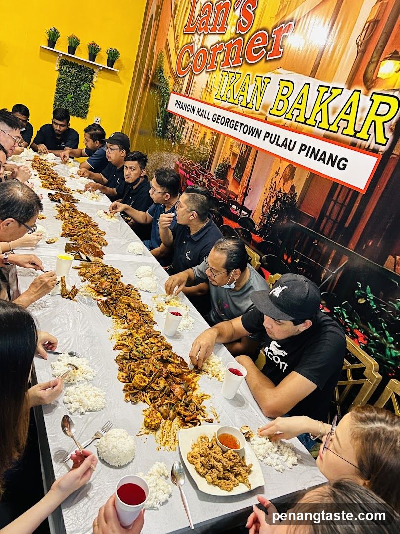 Group eating at Lan's Corner Ikan Bakar restaurant