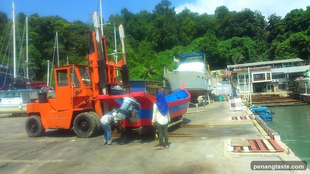 Boat Maintenance at Dock