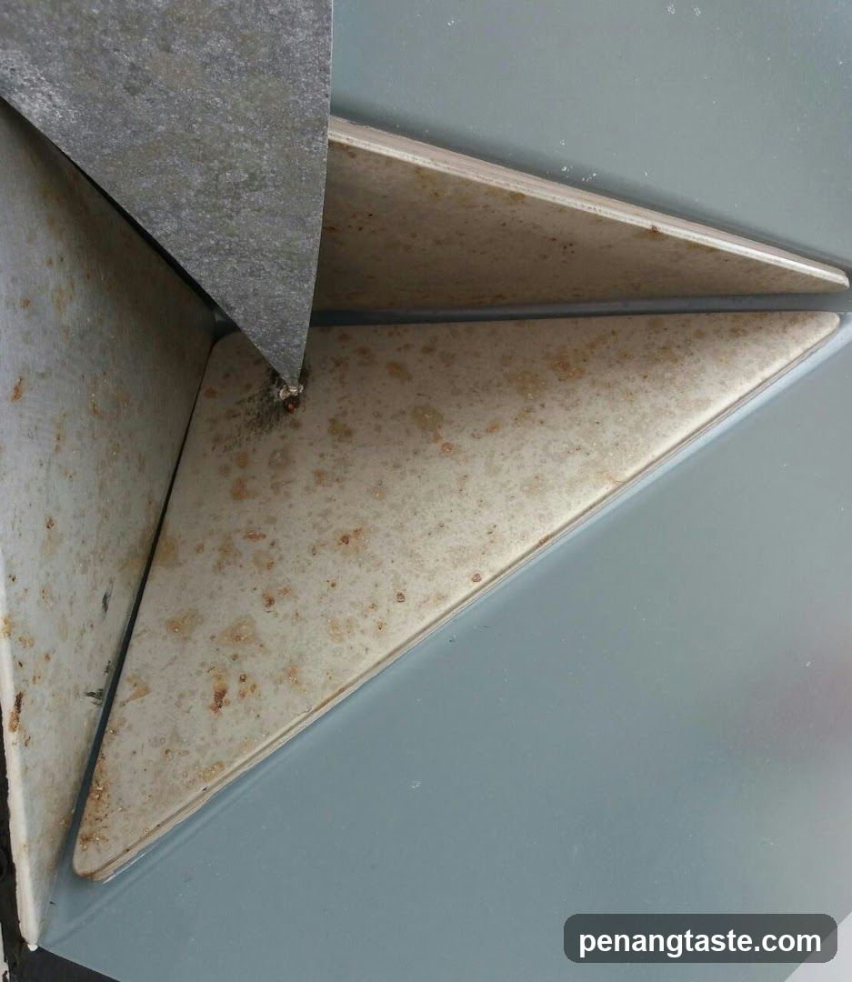 Rusty metal corner with triangular panel