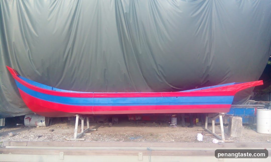 Painted Boat Under Cover
