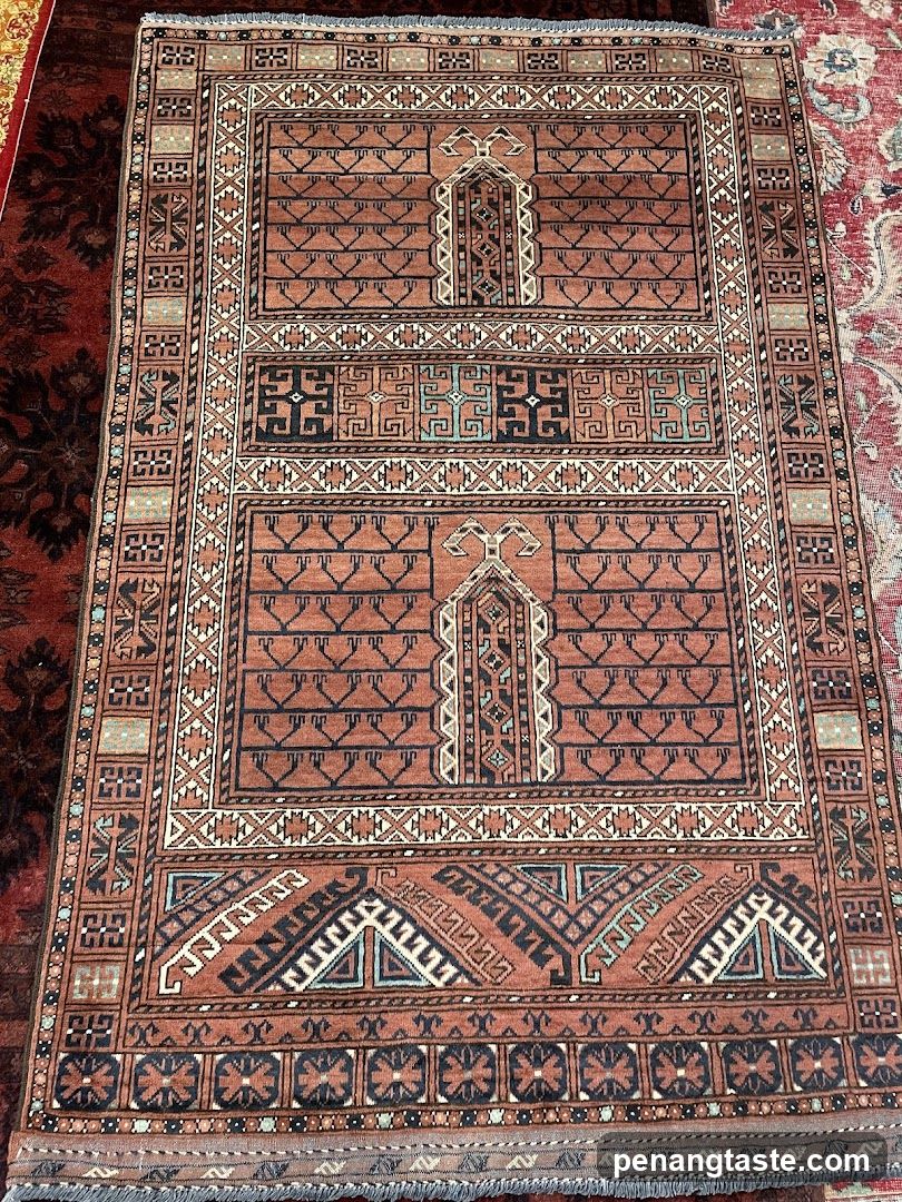 Persian-style rug with geometric patterns