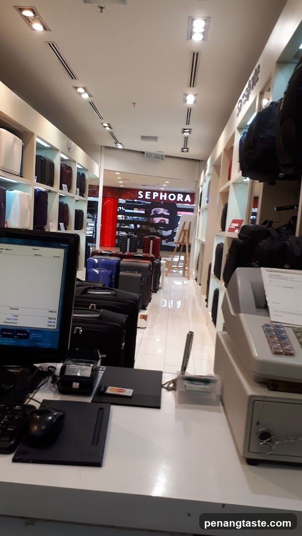 Luggage Store Interior with Sephora in Background