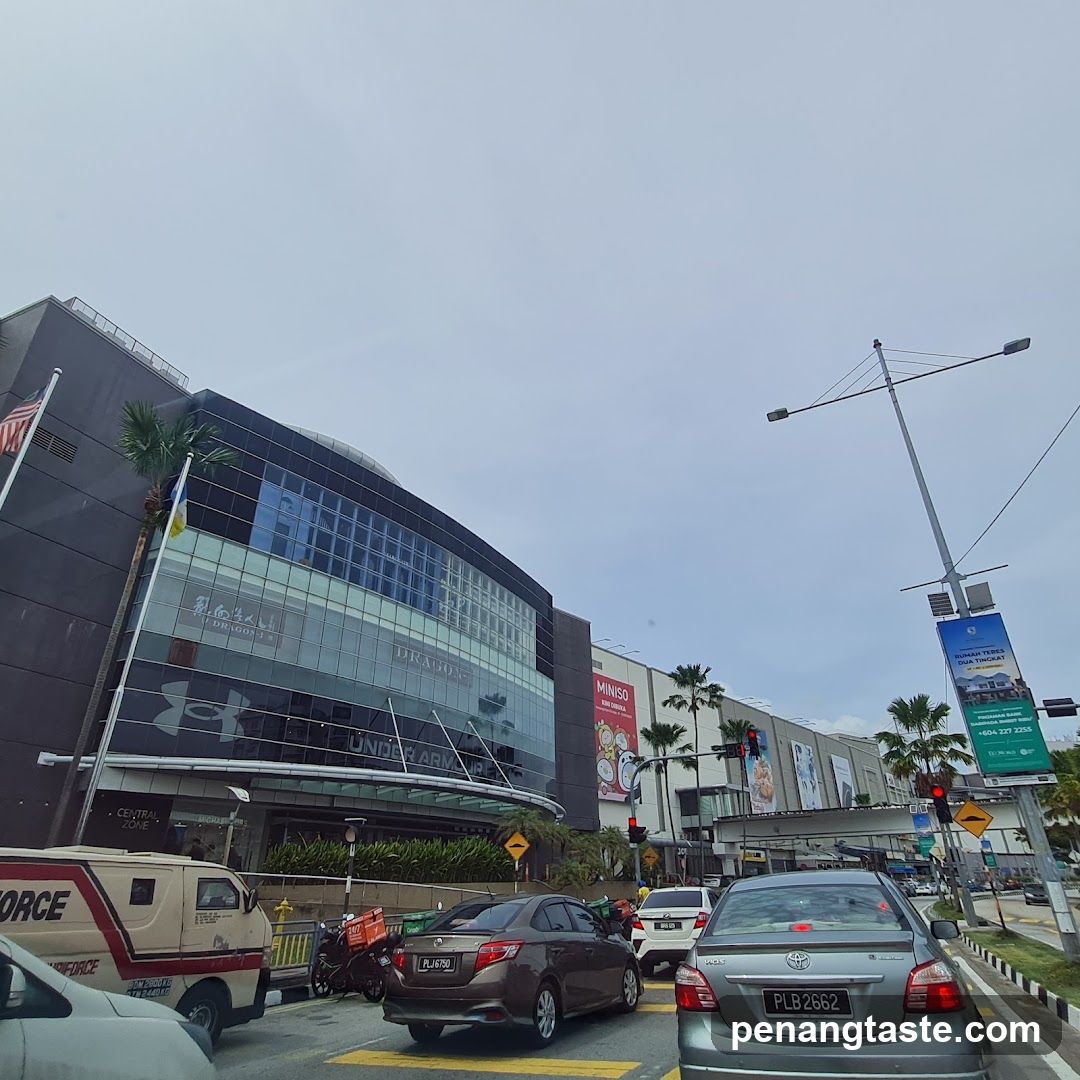 Shopping Mall Exterior with Traffic
