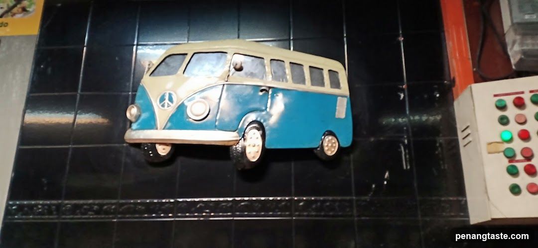Vintage VW Bus Toy on Shelf