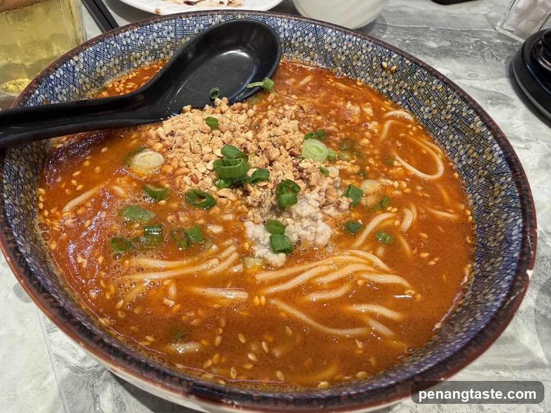 Bowl of Spicy Noodle Soup with Toppings