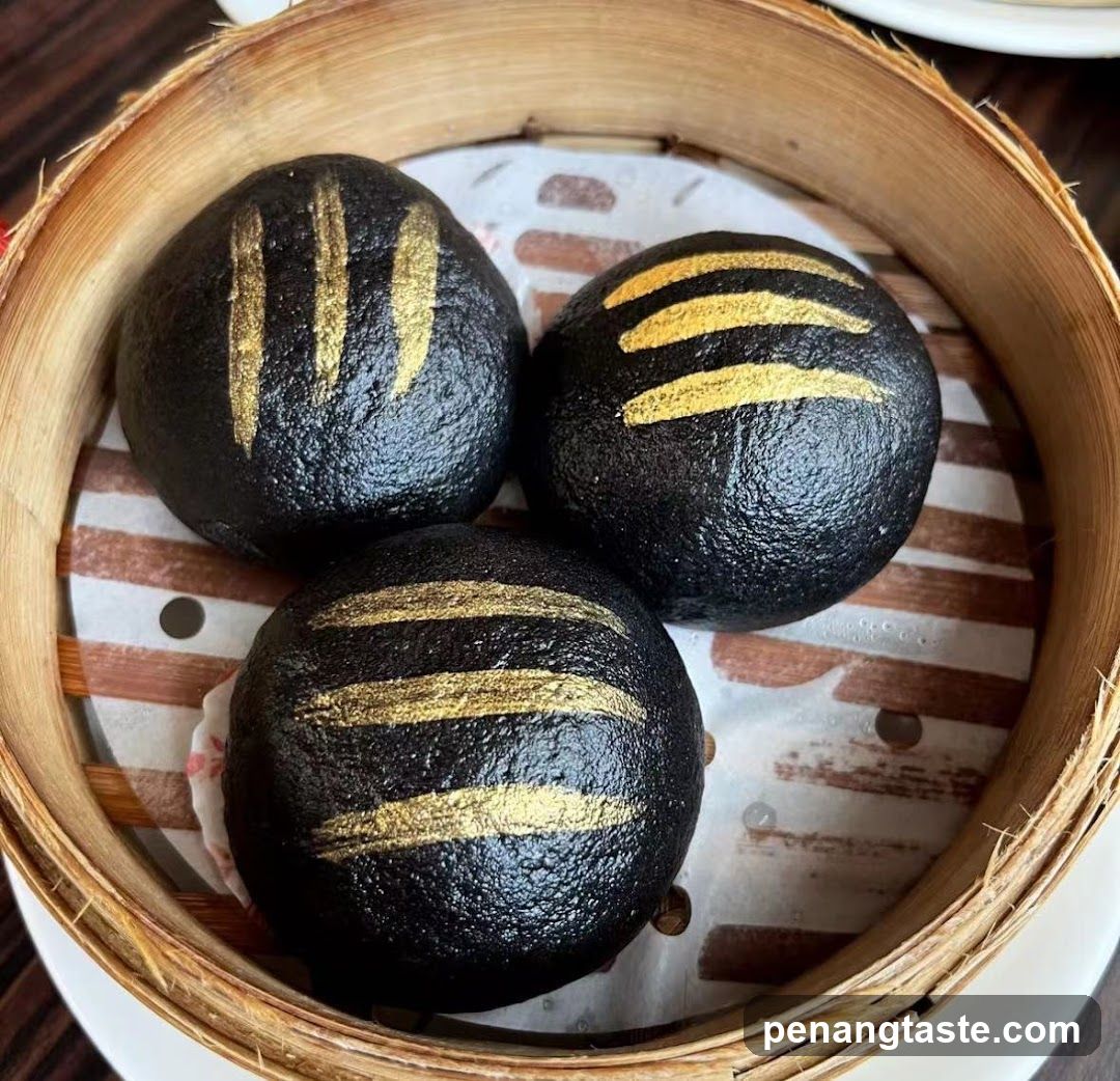 Black Steamed Buns with Gold Stripes