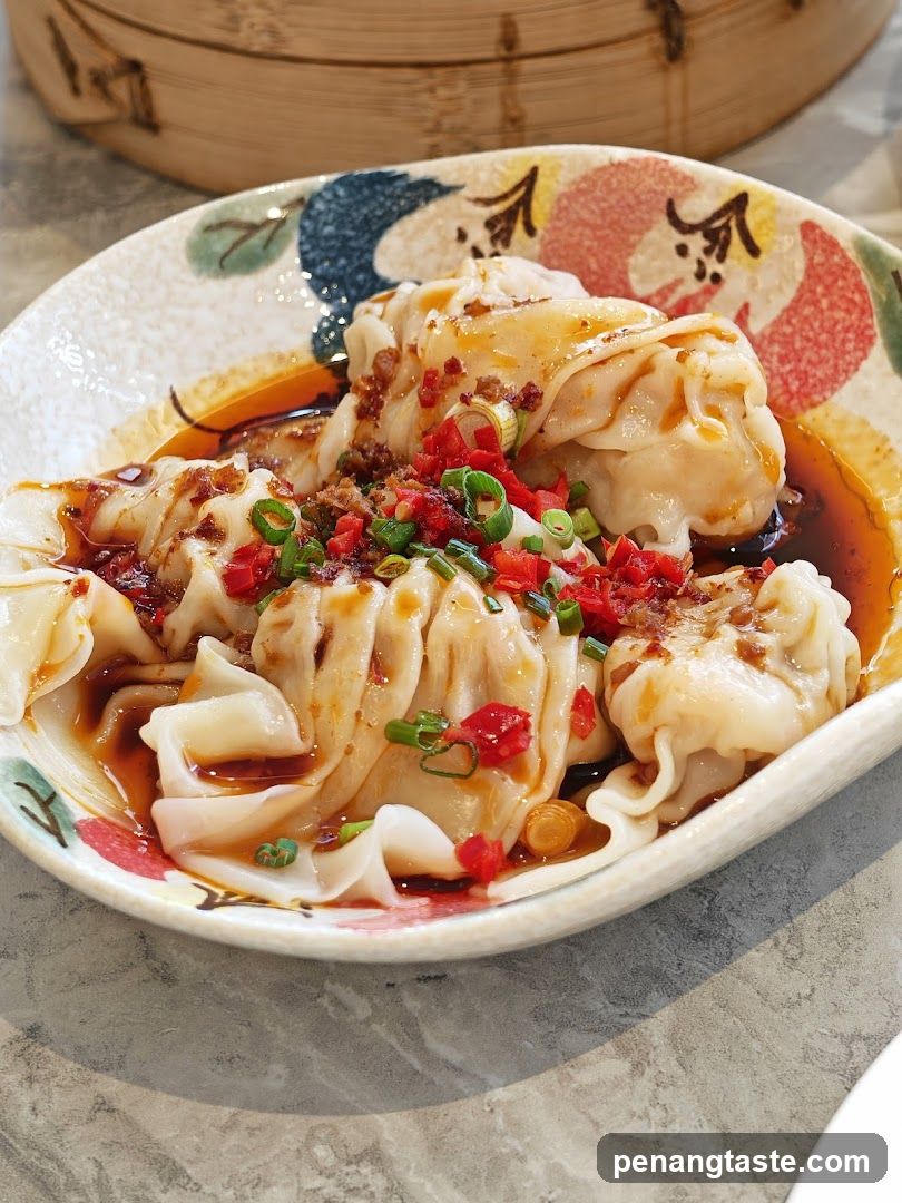 Dumplings with Chili Oil and Scallions