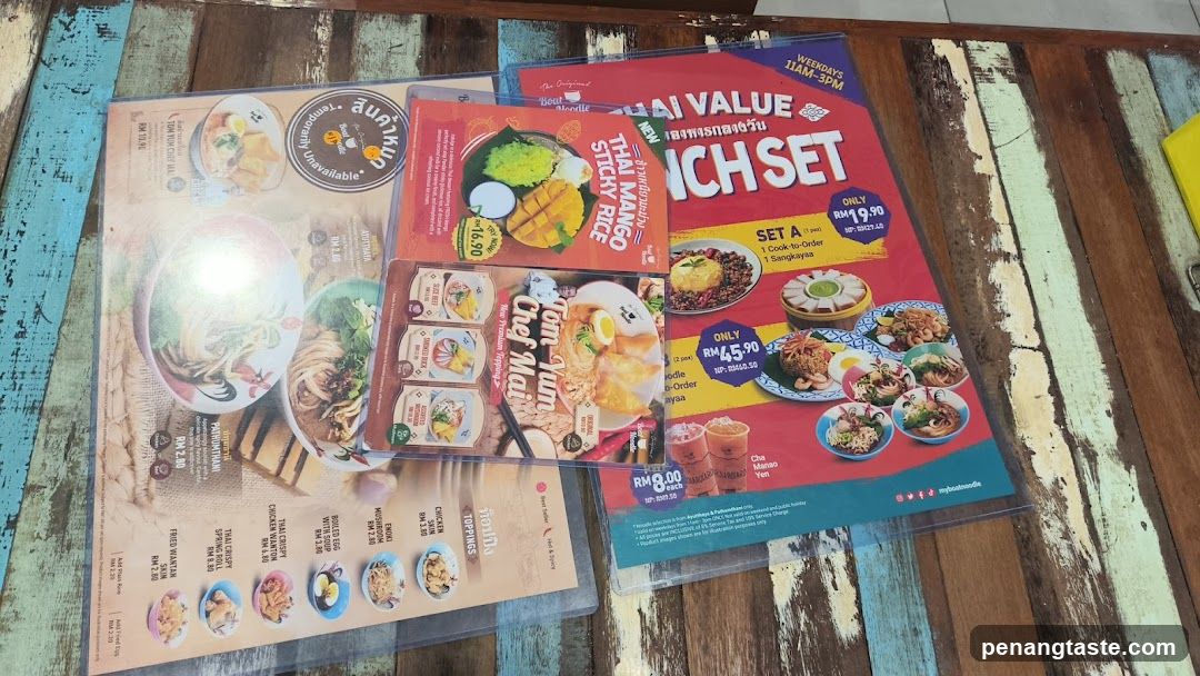 Food Menu Flyers on Wooden Table