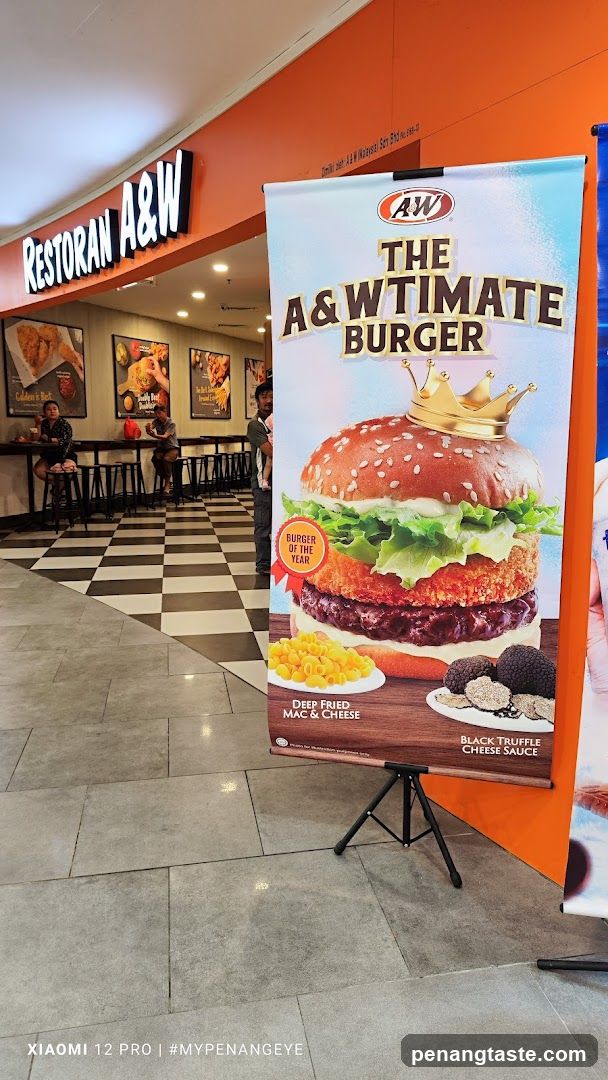 A&W Restaurant Interior with Burger Ad
