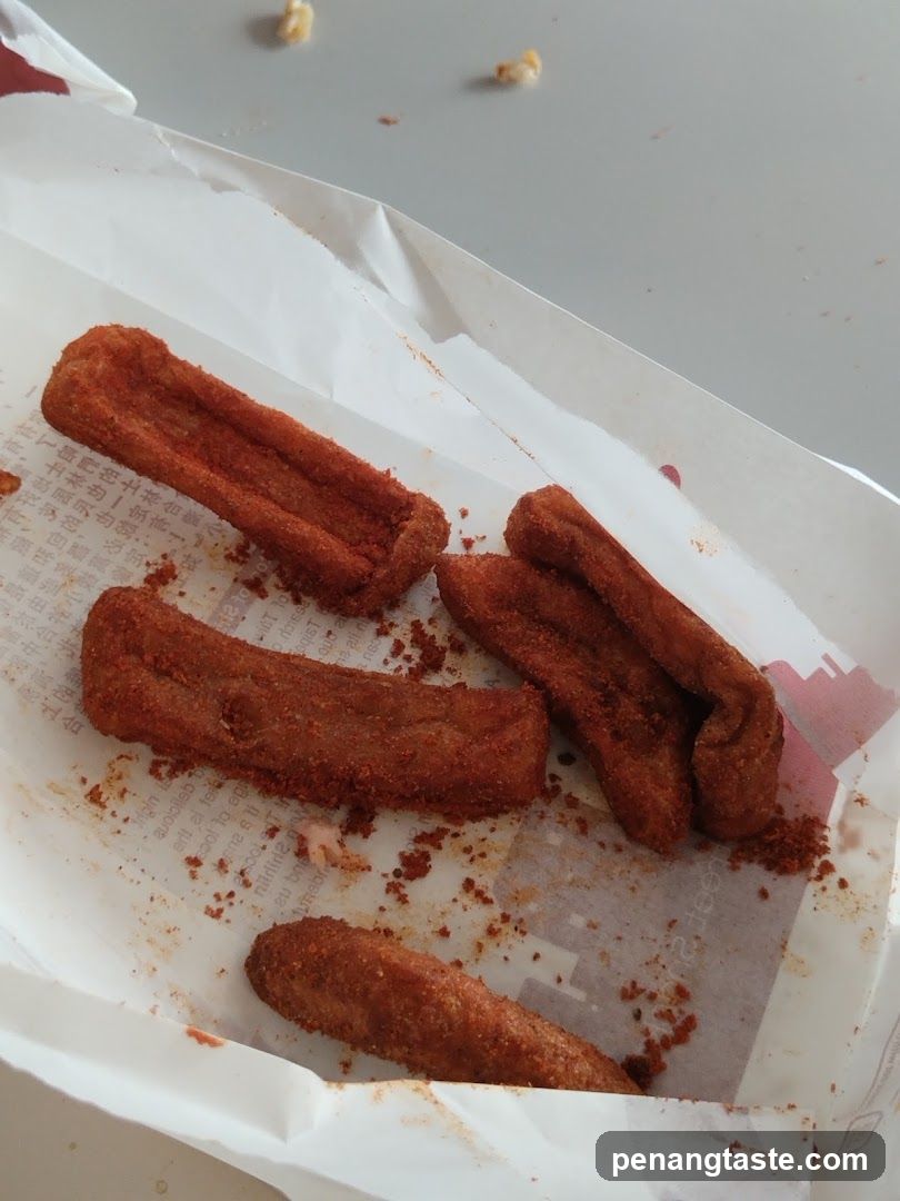 Spicy Fried Snacks in Paper Container