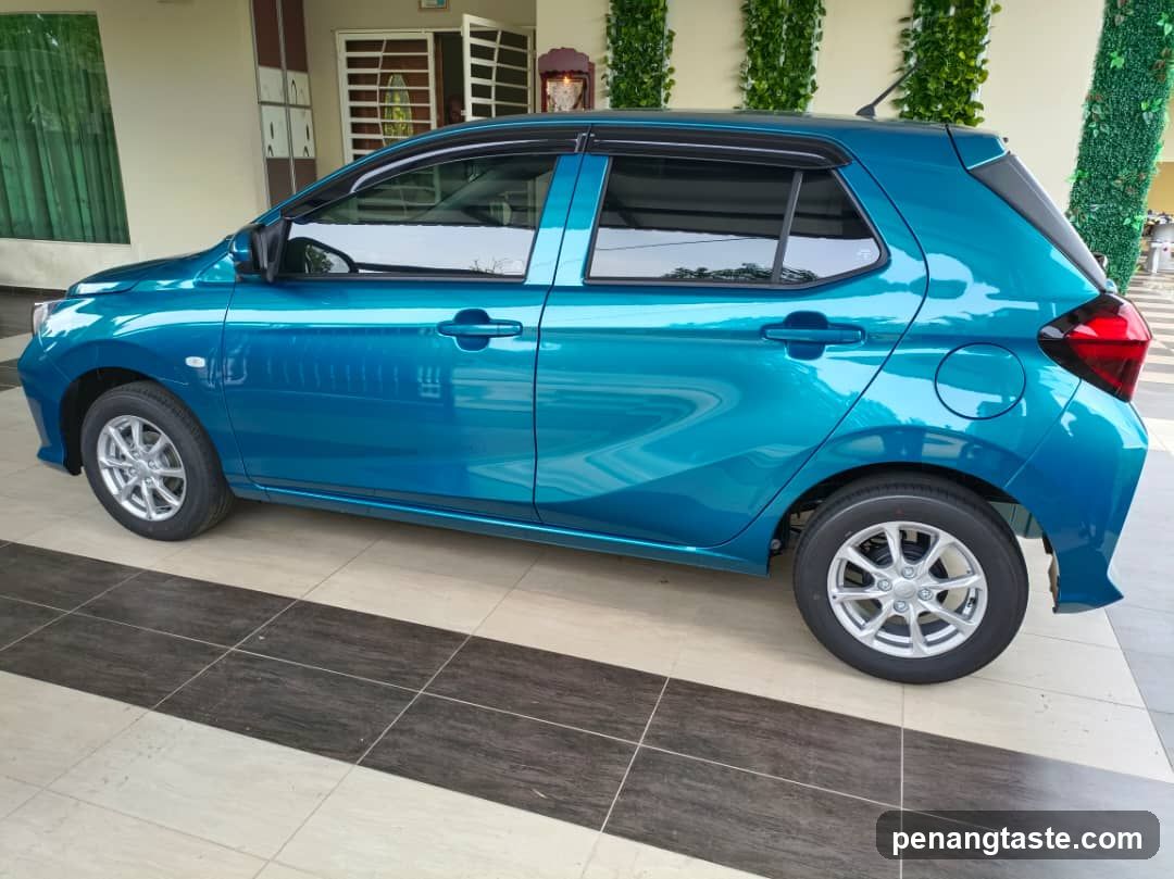 Blue Hatchback Car Side View