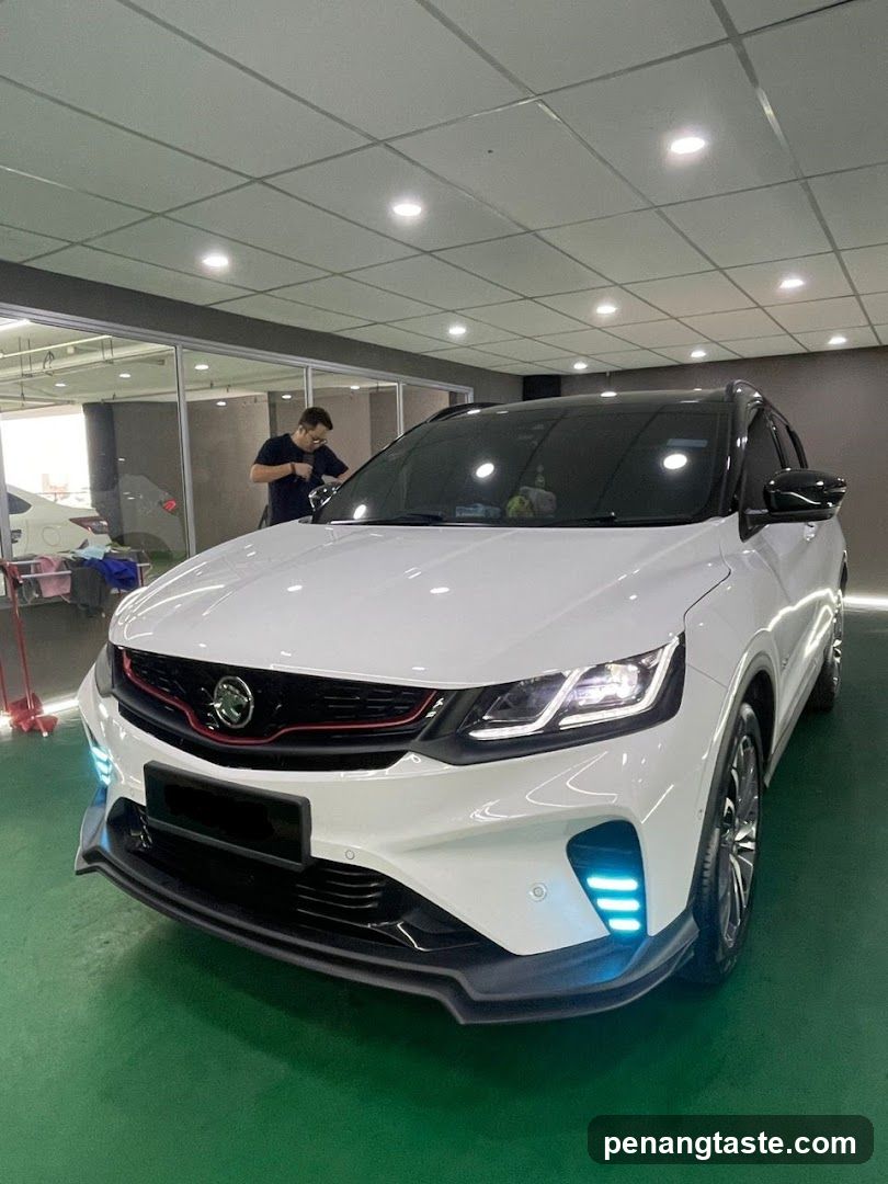 White SUV in Auto Detailing Shop