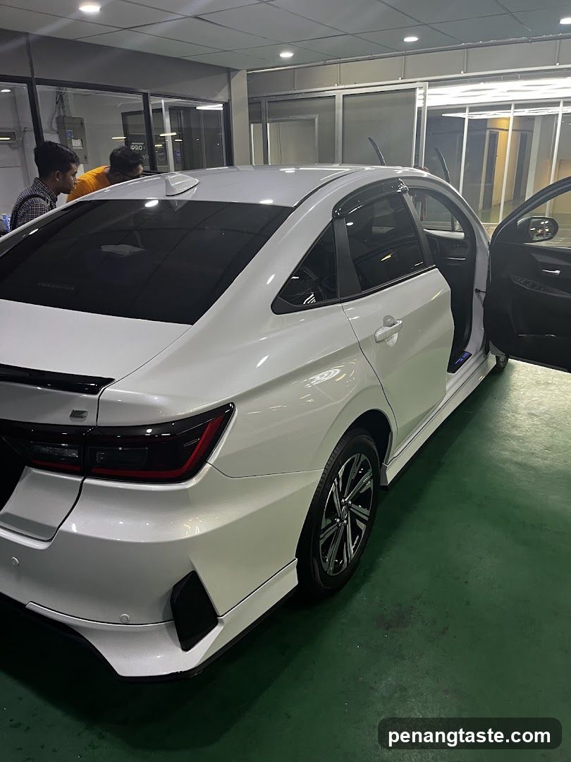 White Sedan in Workshop
