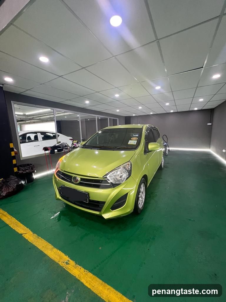 Green Car in Garage