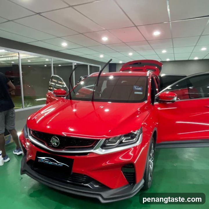 Red SUV in Detail Shop