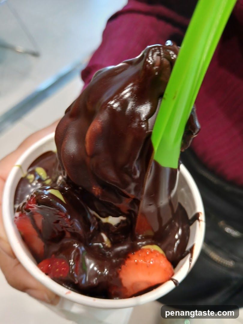 Chocolate-covered strawberries in a cup