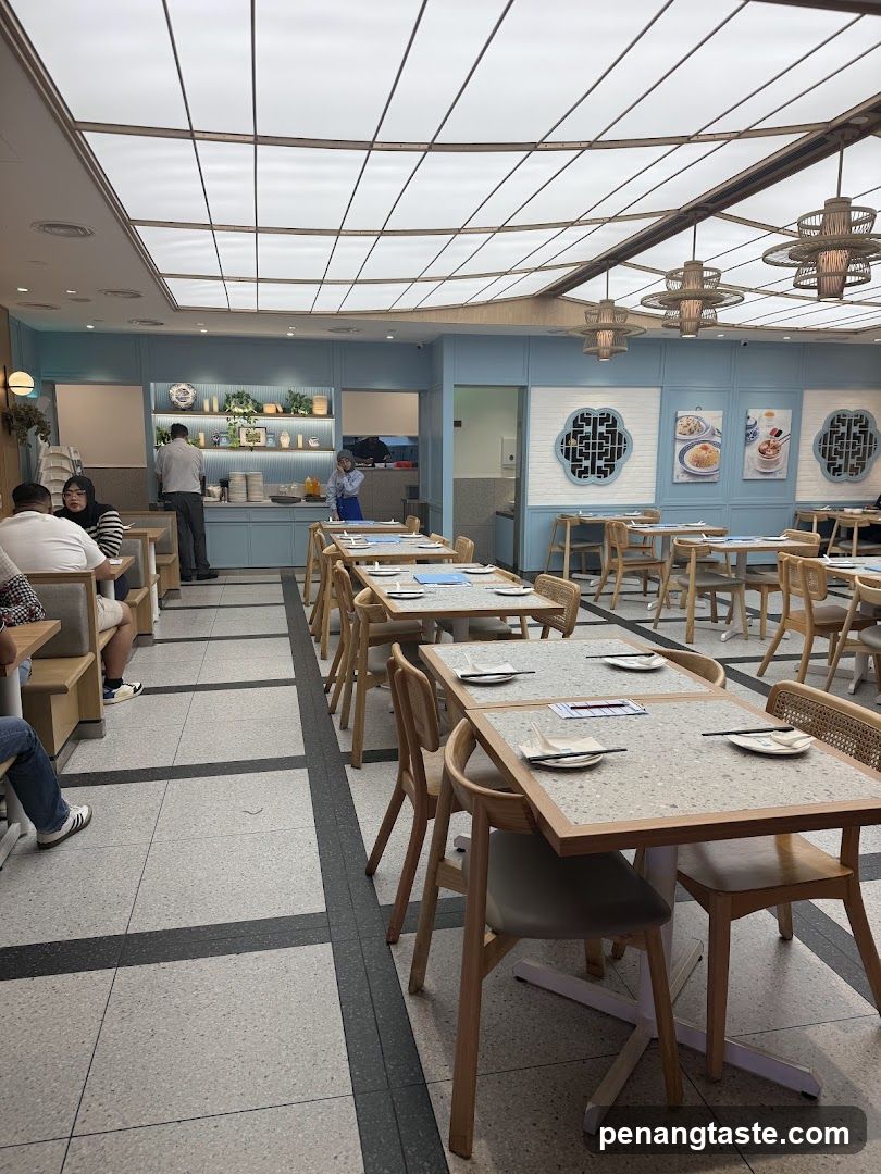 Restaurant Interior with Blue Walls and Wooden Tables