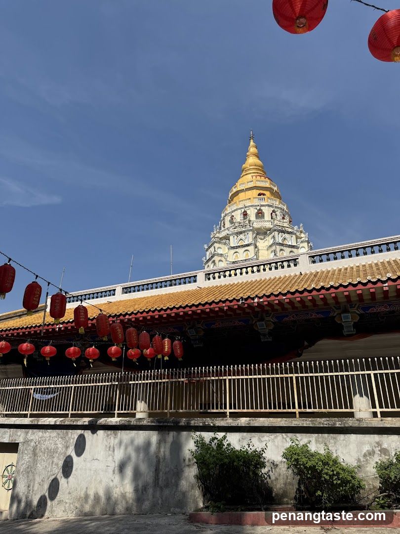 Temple with Golden Spire and Red Lanterns