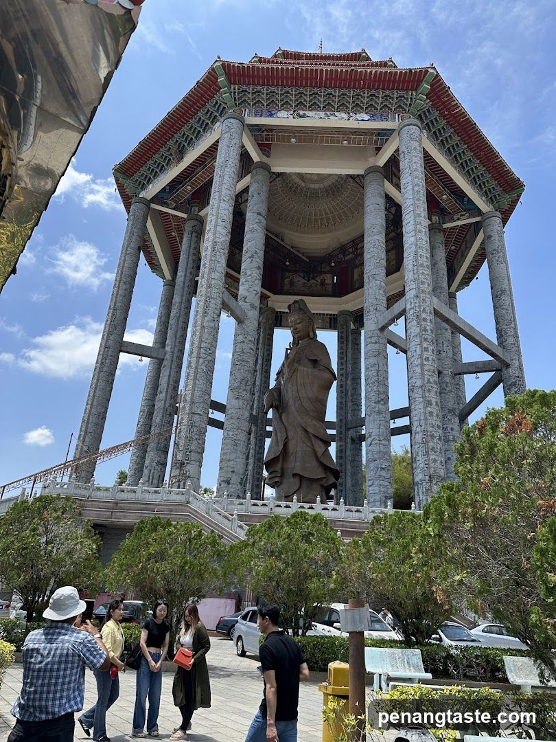 Statue under pavilion