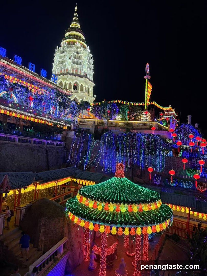 Night Festival Scene with Illuminated Tower and Lanterns
