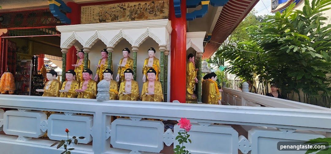 Buddha statues in temple setting