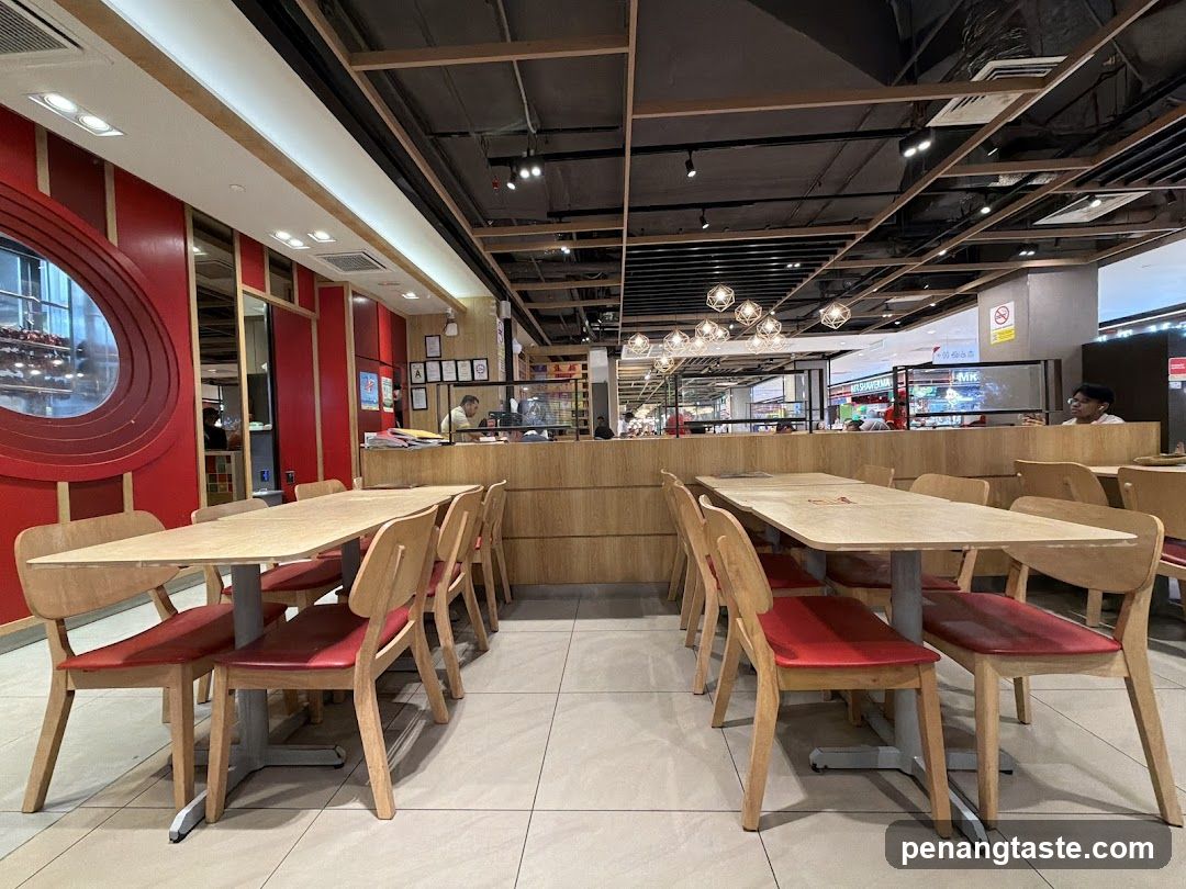 Restaurant Interior with Wooden Tables and Red Chairs