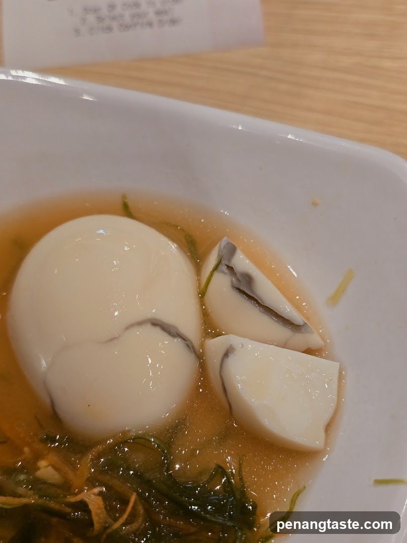 Boiled Egg with Broth and Seaweed