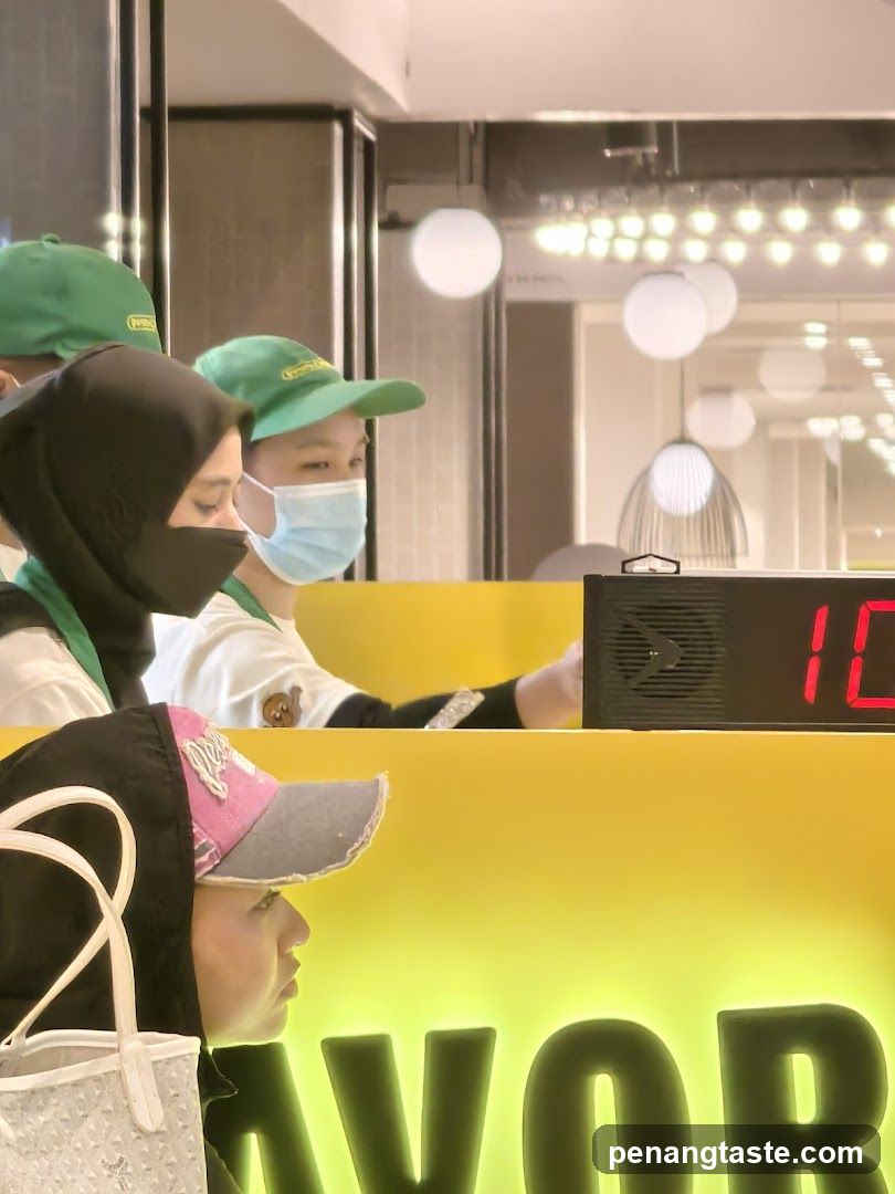 Staff at a food service counter