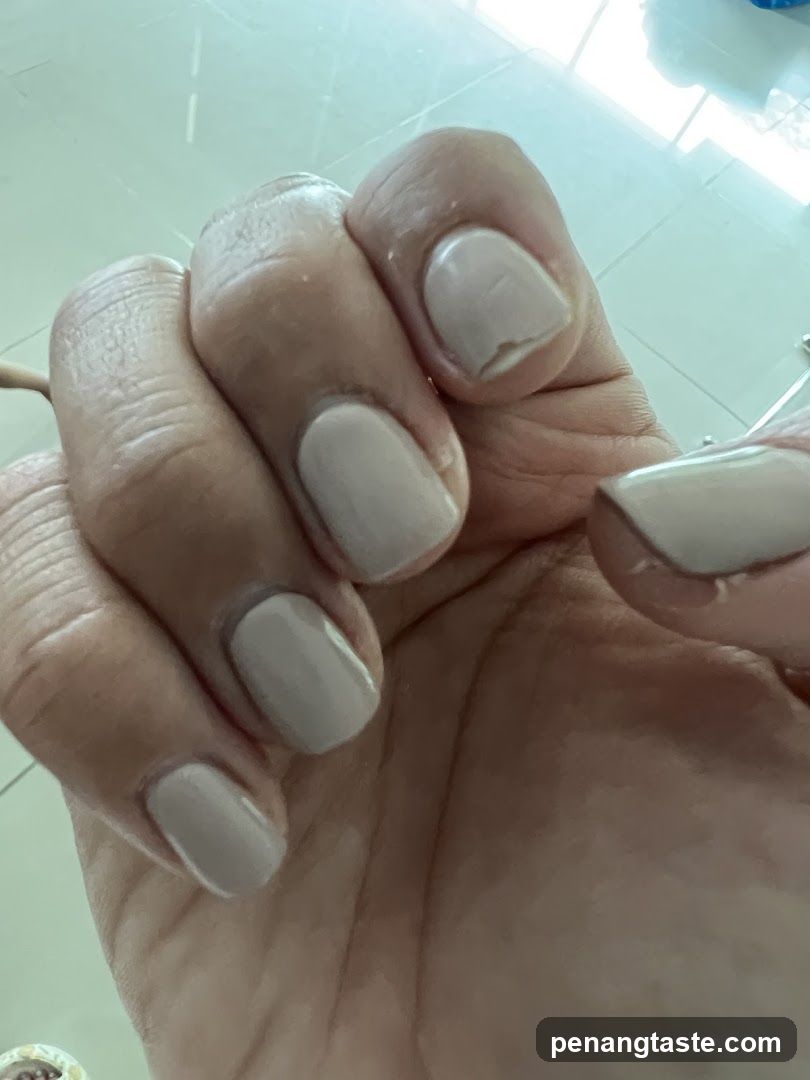 Hand with painted nails