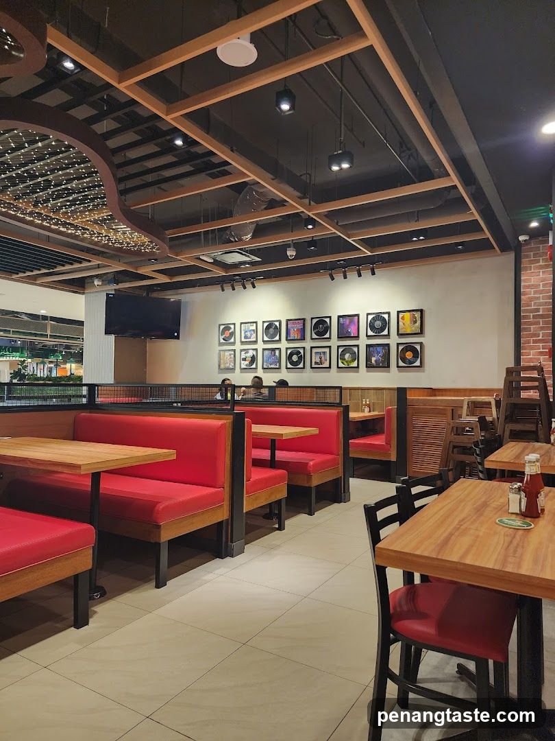 Restaurant Interior with Red Booths and Vinyl Records Wall Art