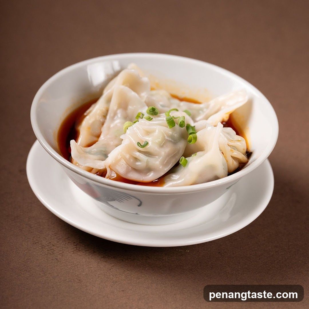 Bowl of Dumplings with Soy Sauce and Scallions