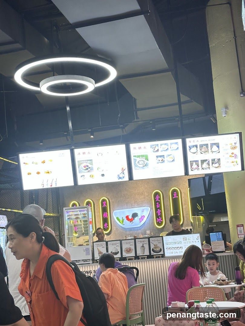 Food stall interior with menu boards and customers