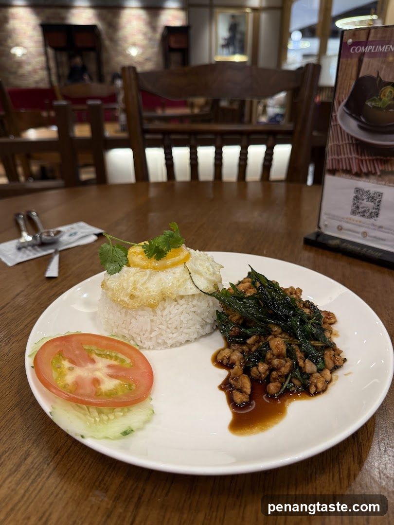 Plate of Thai-style Fried Rice with Minced Pork and Basil