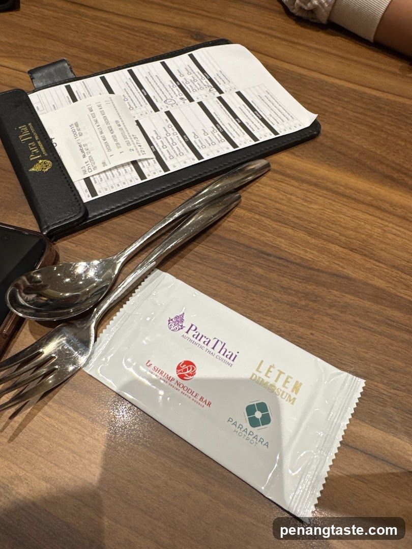 Table setting with menu and cutlery