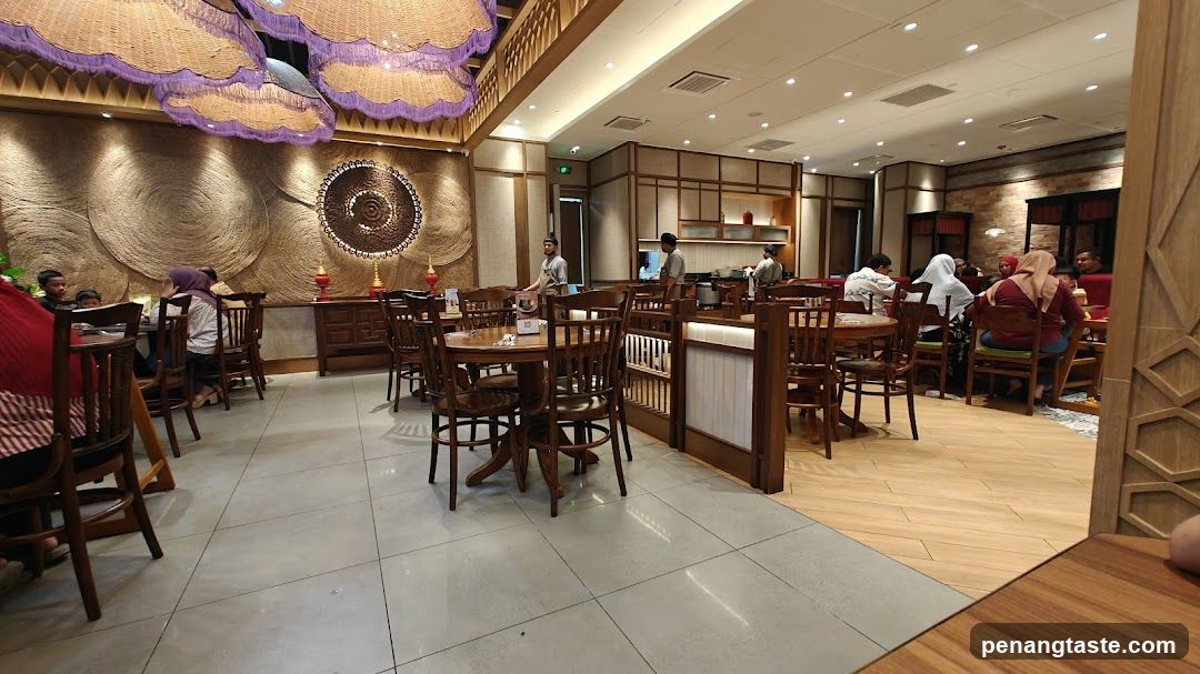 Restaurant Interior with Wooden Furniture and Decorative Ceiling