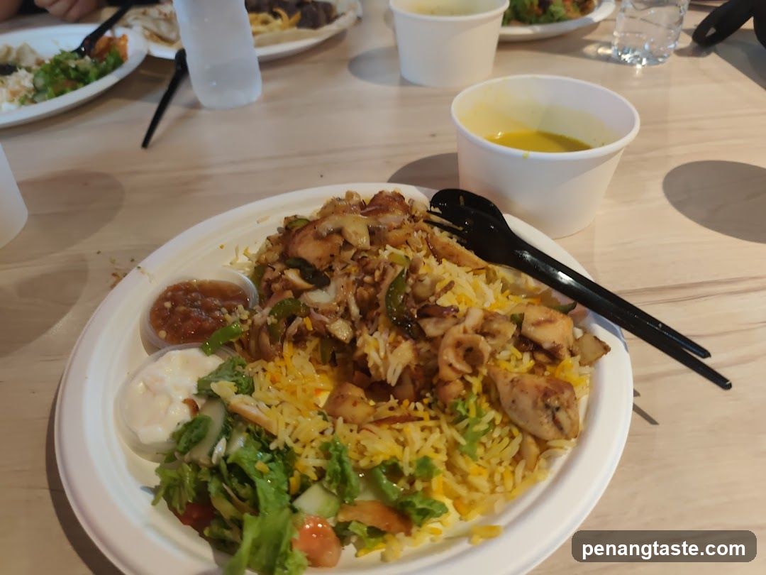 Chicken Biryani with Salad and Curry