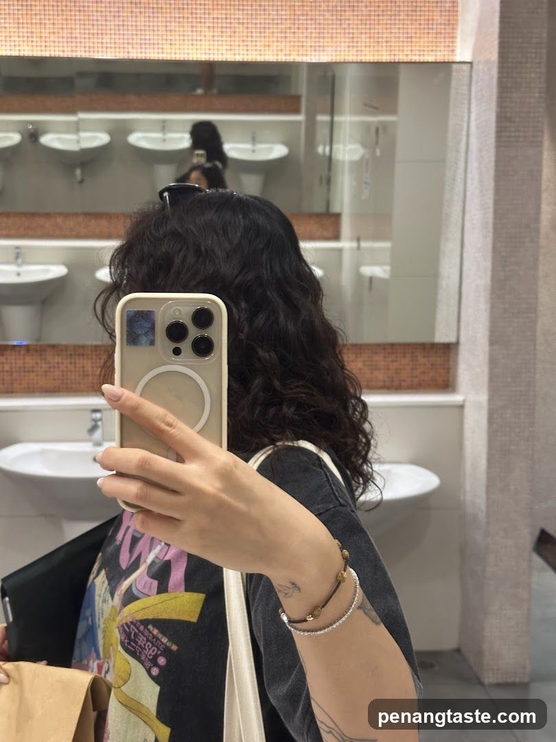 Mirror selfie in restroom