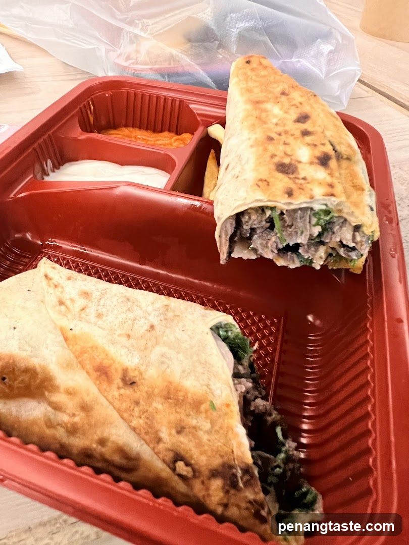 Food Tray with Wraps and Sauces
