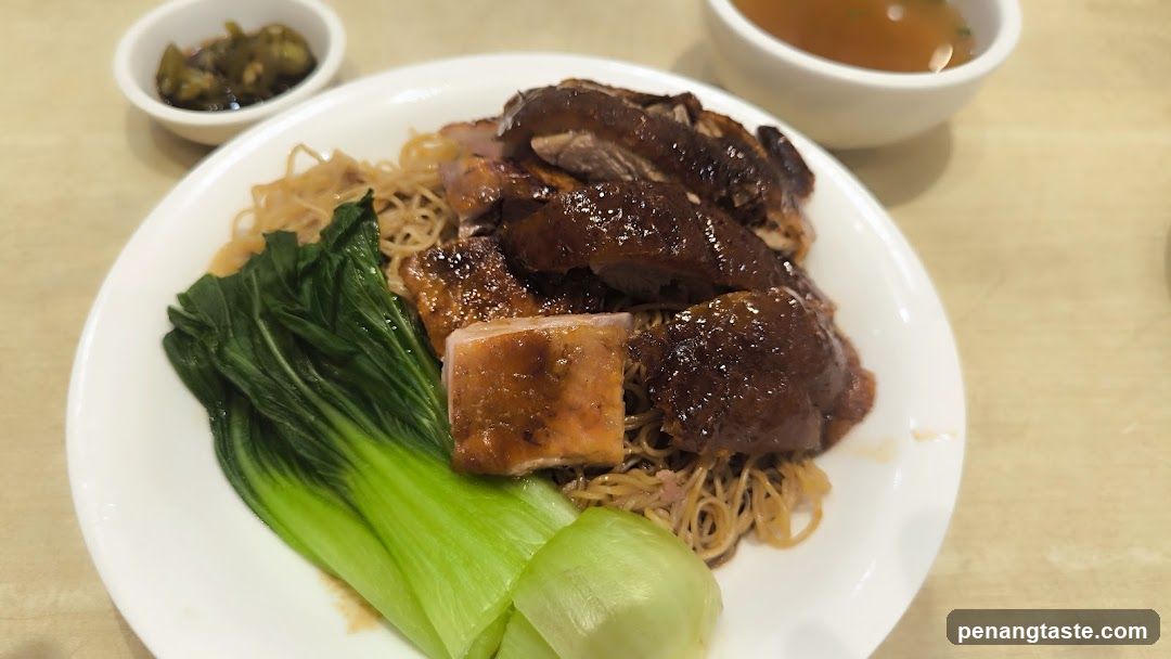 Duck Noodle Dish with Vegetables and Sauces