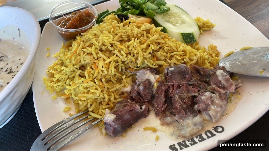 Plate of Yellow Rice with Meat and Salad
