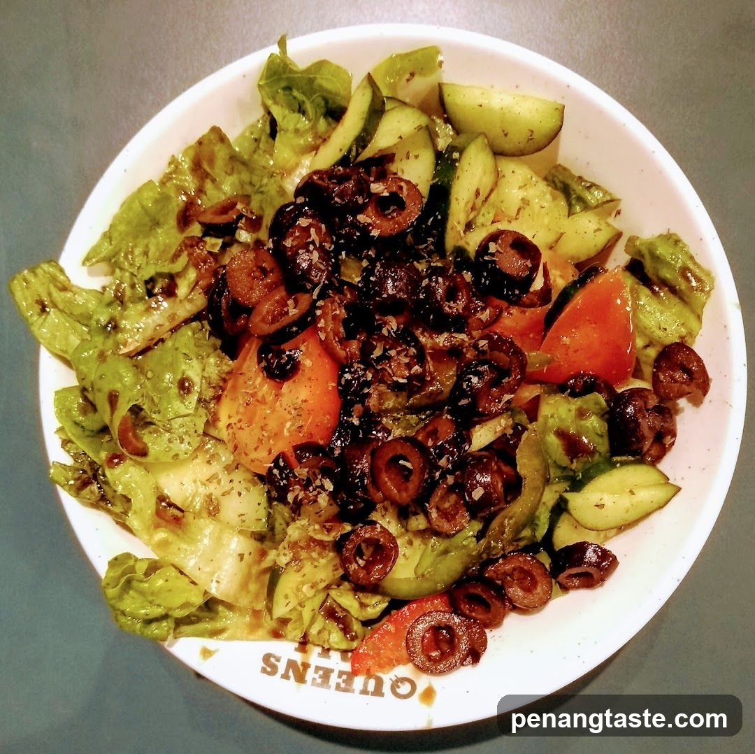 Salad Bowl with Olives and Dressing