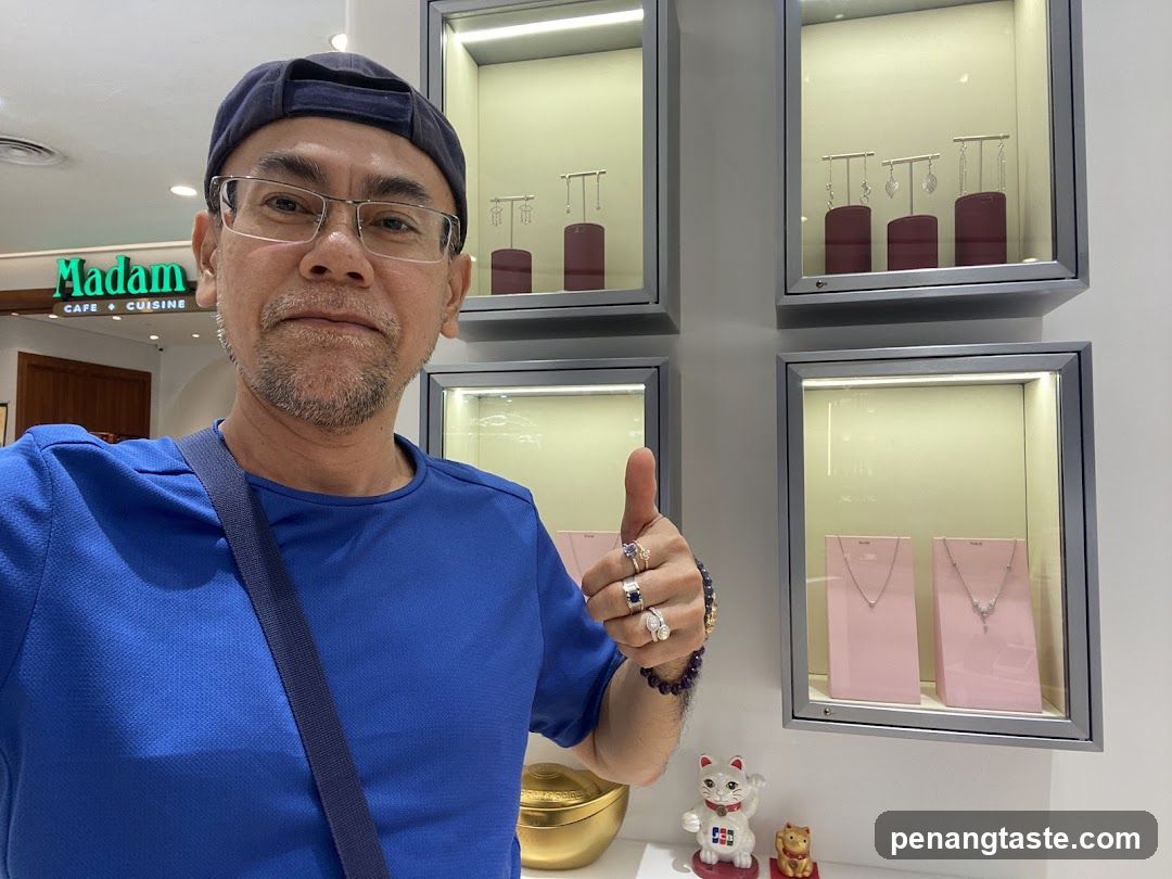 Man giving thumbs up in jewelry store