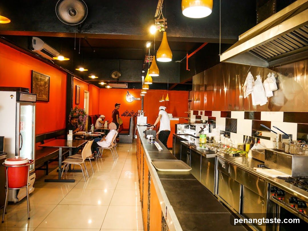 Restaurant Interior with Kitchen View