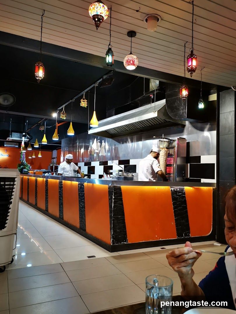 Restaurant Interior with Open Kitchen