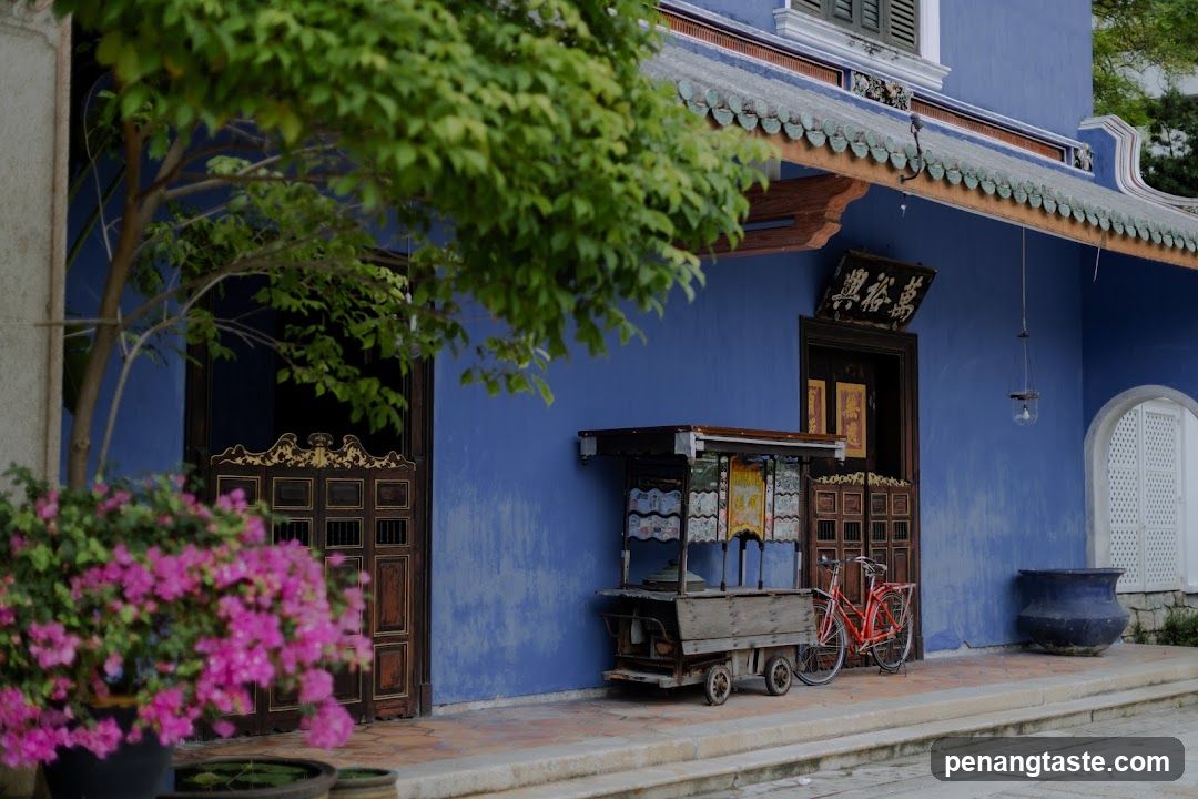 Blue Building Exterior with Food Cart