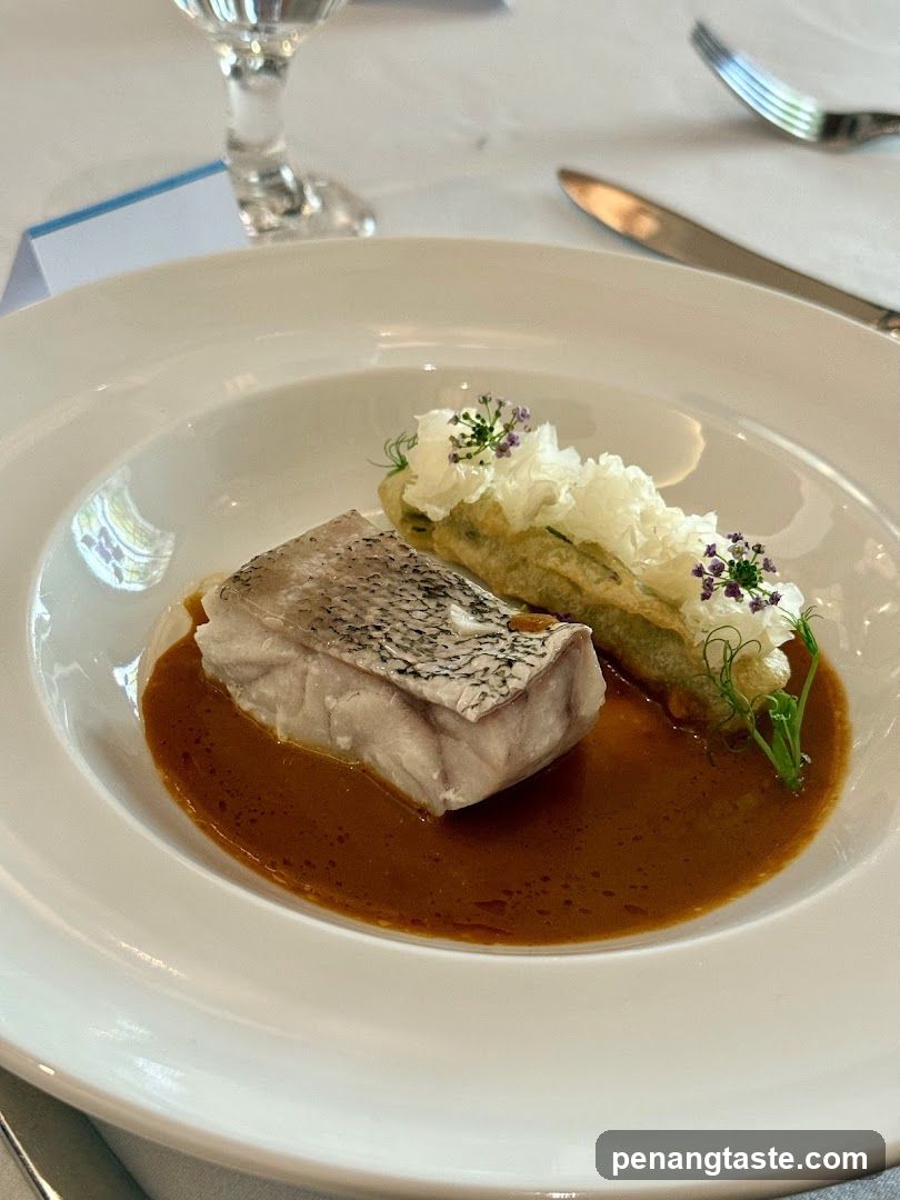 Elegant Fish Dish with Sauce and Garnish