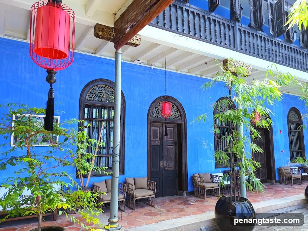 Blue Building Exterior with Red Lanterns